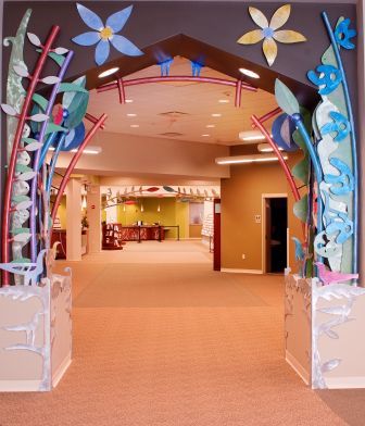 Archway with flower sculptures